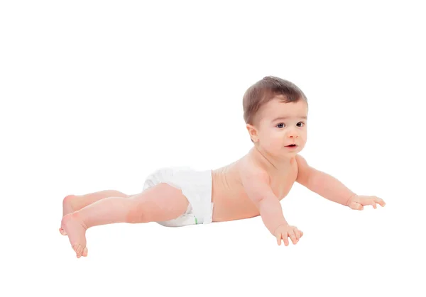 Rozkošný šestiměsíční dítě v plenka leží na podlaze — Stock fotografie