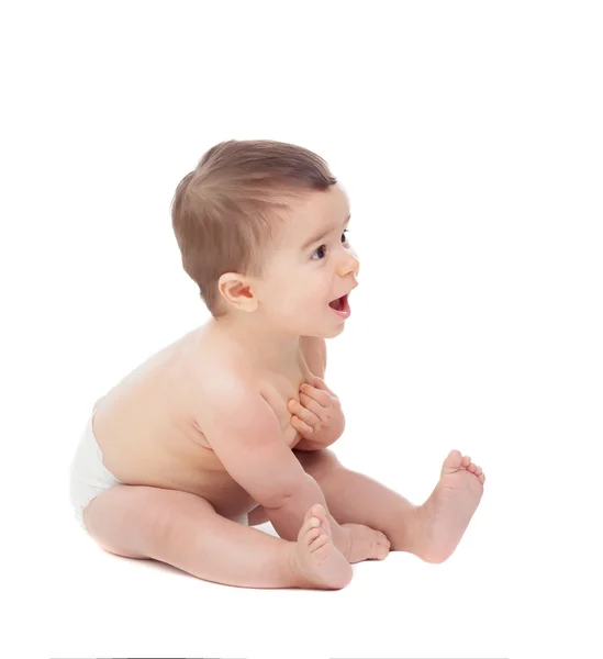 Surprised six month baby in diaper — Stock Photo, Image