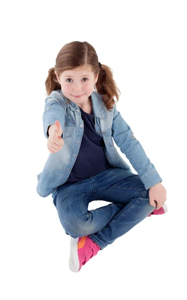 Adorable little girl with saying Ok — Stock Photo, Image