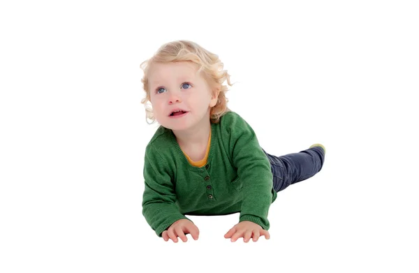 Adorable blond baby lying on the floor — Stock Photo, Image