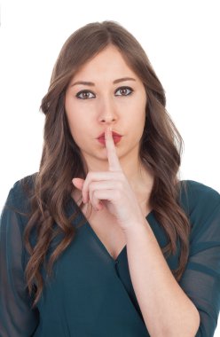 Young woman asking for silence