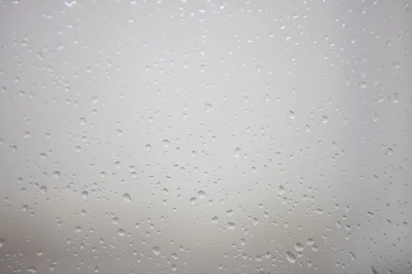 Wet glass with drops of rain — Stock Photo, Image