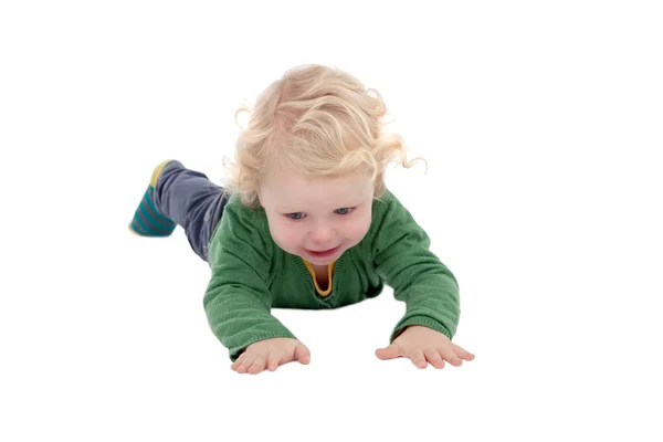 Adorable blond baby lying on the floor — Stock Photo, Image