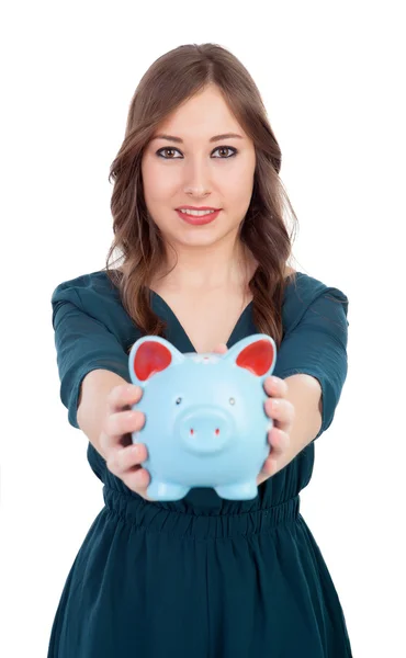 微笑的年轻女孩与一个蓝色的存钱罐 — 图库照片