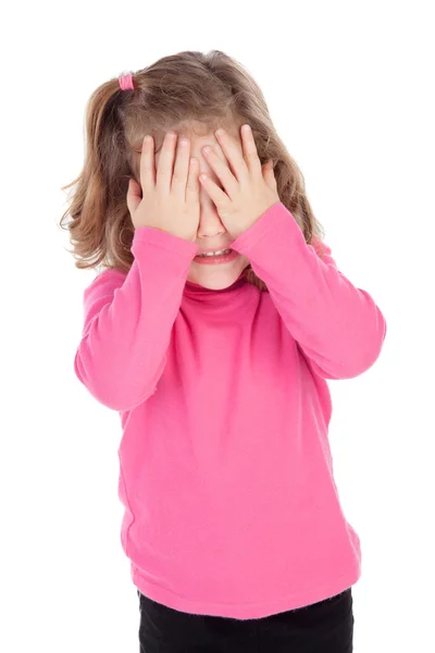 Беспокойная маленькая девочка в розовом — стоковое фото