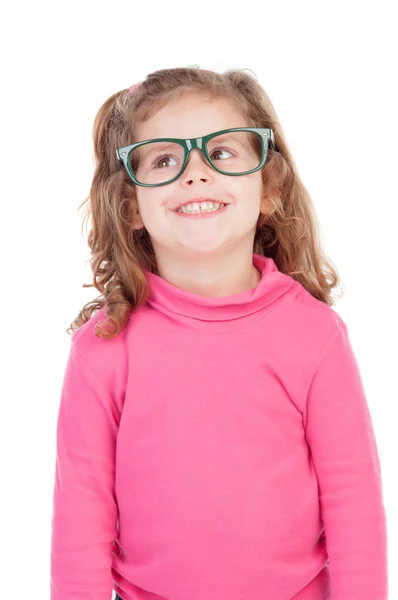 Little girl in pink with glasses looking up Royalty Free Stock Images