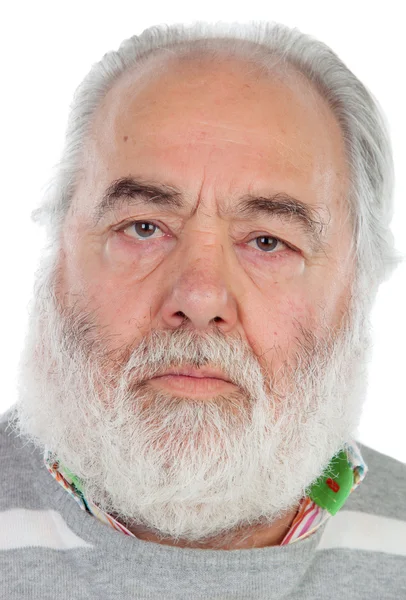 Серьезный пожилой человек с белой бородой — стоковое фото