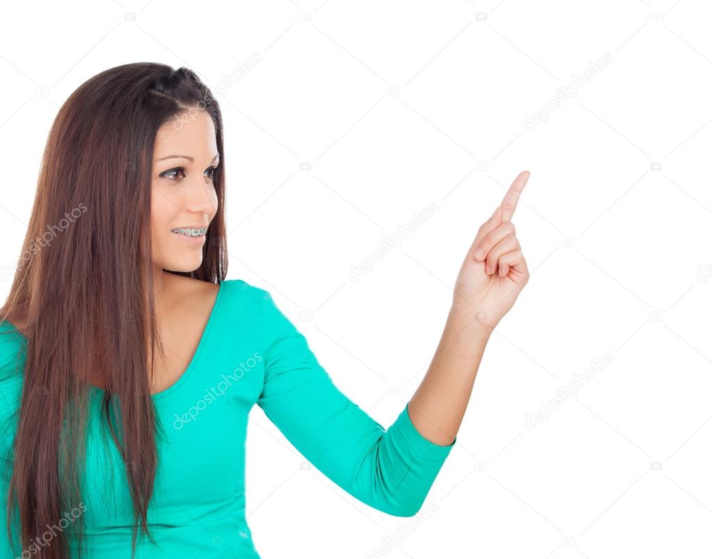 Cool brunette girl inidicating something with her finger