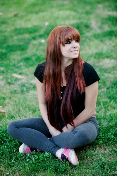 Rebellious teenager girl with red hair — Stock Photo, Image