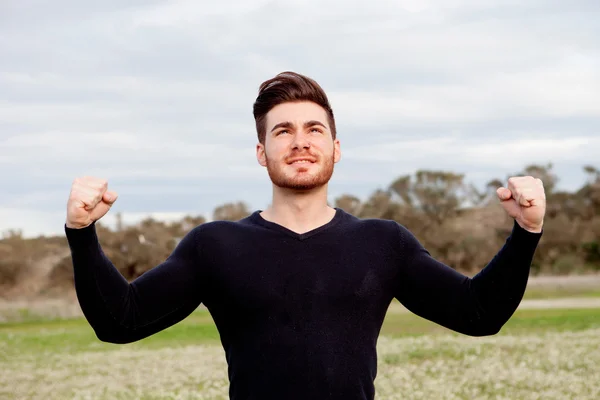 Handsome guy with strong arms — Stock Photo, Image