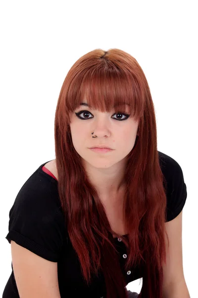 Teenage girl dressed in black with a piercing looking at camera — Stock Photo, Image