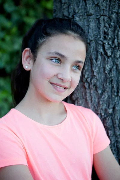 Happy preteen girl with blue eyes smiling — Stock Photo, Image