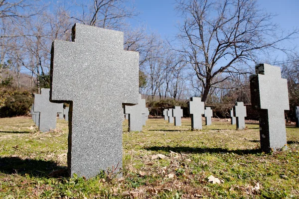 Cemetery with gray crosses — Stock Photo, Image