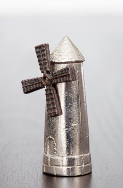 Silver figure of a windmill  