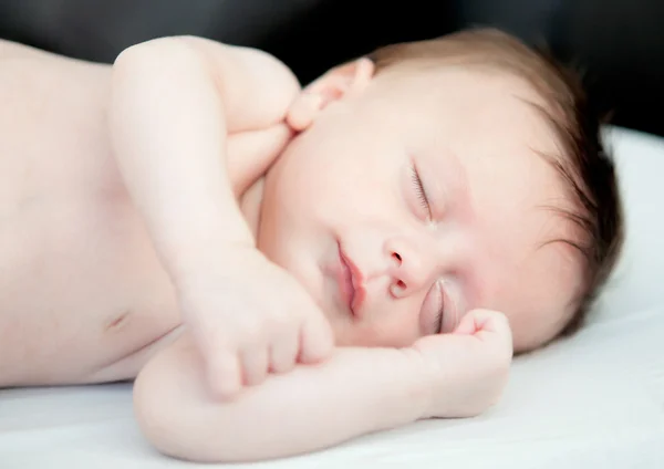 Infant baby sleeping in crib — Stock Photo, Image