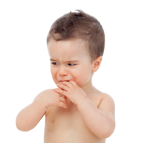 Liten pojke med finger i munnen — Stockfoto