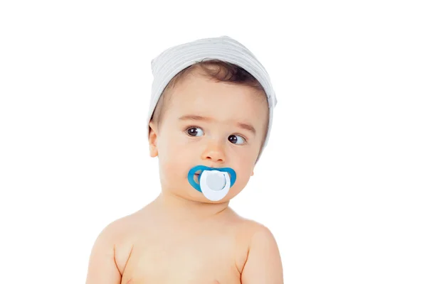 Niño pequeño con chupete en la boca — Foto de Stock