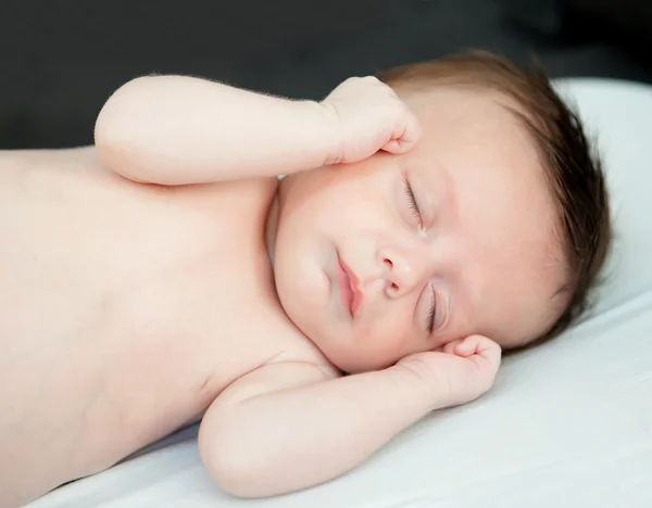 Infant baby sleeping in crib — Stock Photo, Image