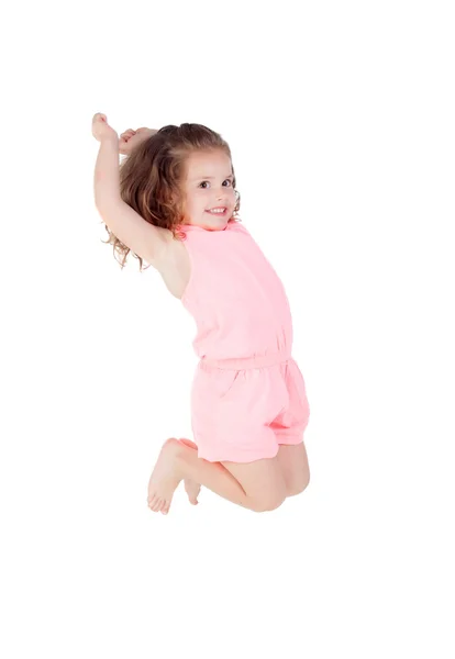 Щаслива маленька дівчинка стрибає — стокове фото