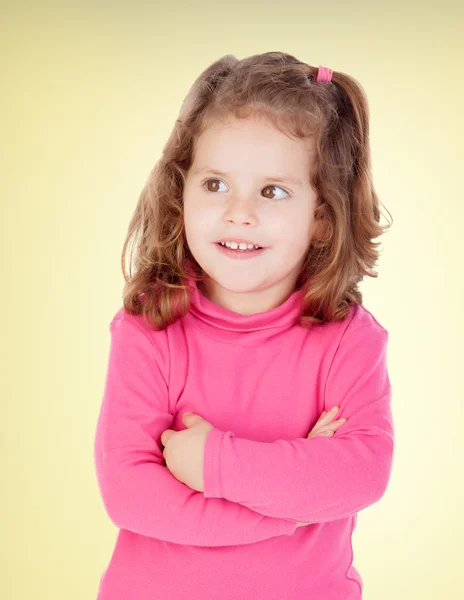 Klein meisje in roze — Stockfoto