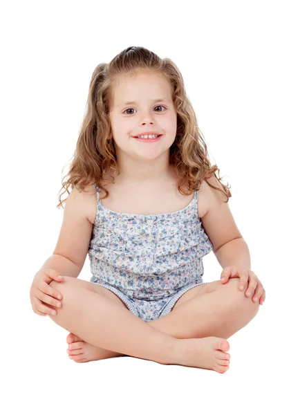 Cute little girl with three year old sitting on the floor — Stok fotoğraf