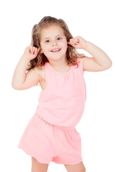 Klein meisje die betrekking hebben op haar oren — Stockfoto
