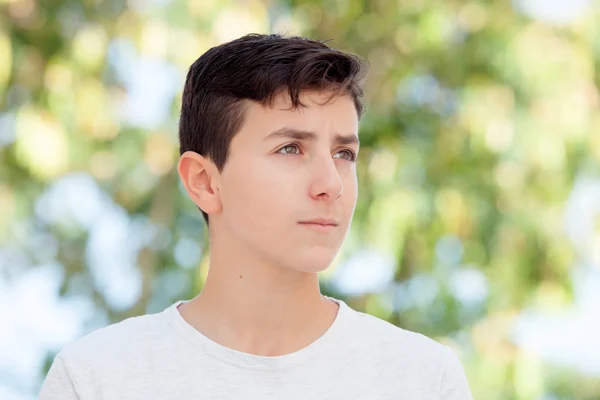 Teenage boy smiling outside — Stock Photo, Image