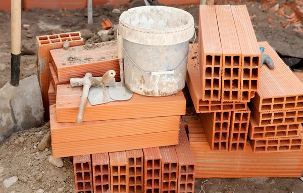 Brick and construction tools — Stock Photo, Image
