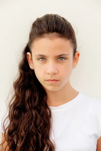 Angry preteen girl with blue eyes — Stock Photo, Image