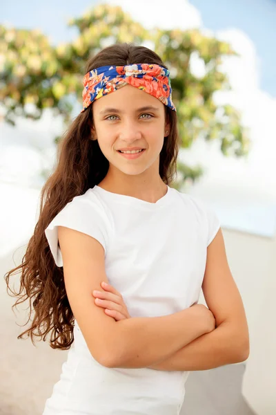 Teenager girl with a flowered headband — Stock Photo, Image