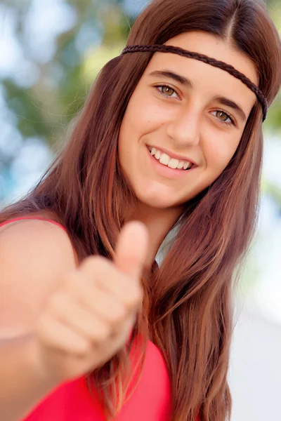 Teenage Girl weergegeven: duim omhoog — Stockfoto