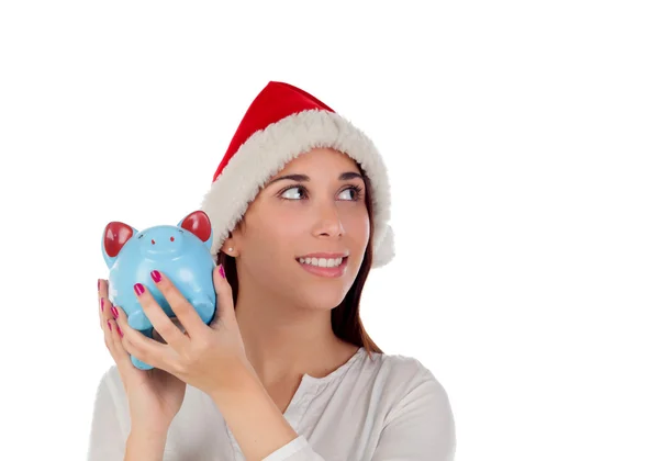 Woman with Christmas hat and piggy bank Stock Picture