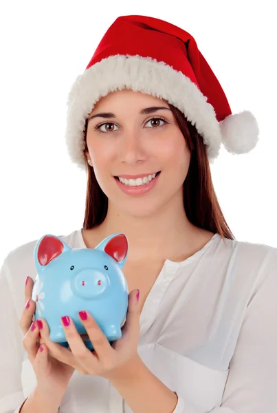 Woman with Christmas hat and piggy bank Royalty Free Stock Images