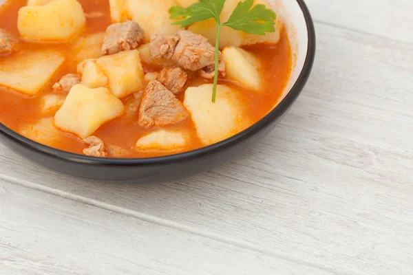 Delicious dish of cooked potatoes with meat Stock Picture