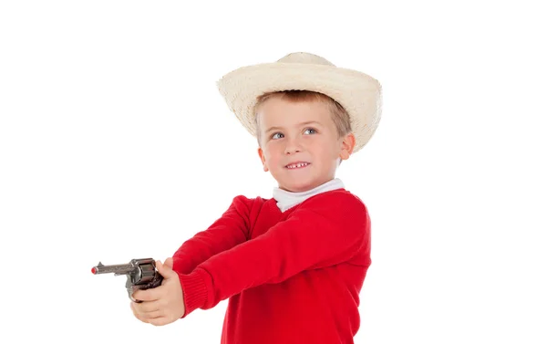 Kleine jongen speelt met een pistool — Stockfoto