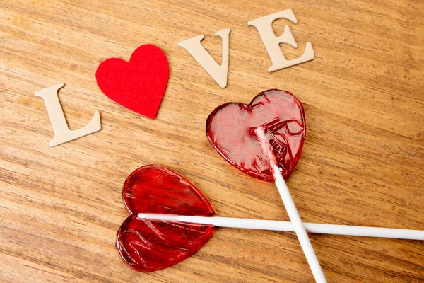 Red heart shaped lollipops — Stock Photo, Image