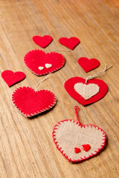 Valentine hearts on wooden background — Stock Photo, Image