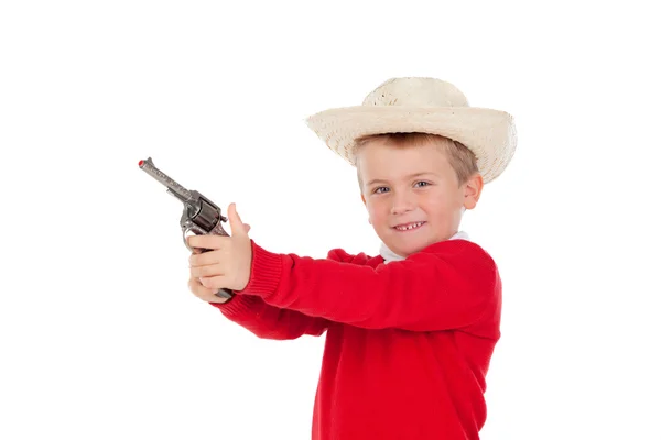 Маленький мальчик играет с пистолетом — стоковое фото