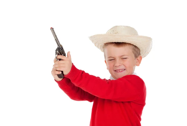Маленький мальчик играет с пистолетом — стоковое фото
