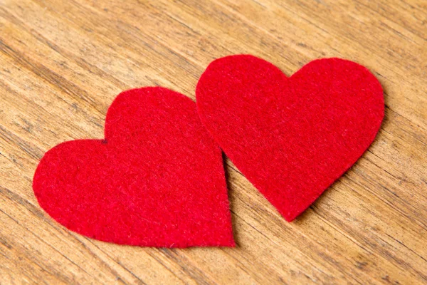 Valentine srdce na dřevěné pozadí — Stock fotografie