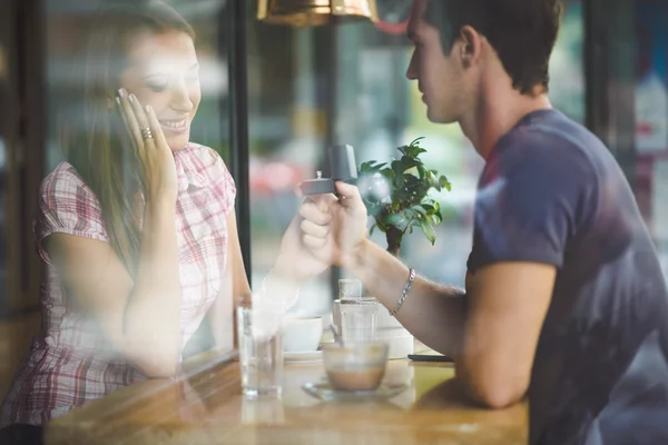 Engagement ring in cafe — Stock Photo, Image