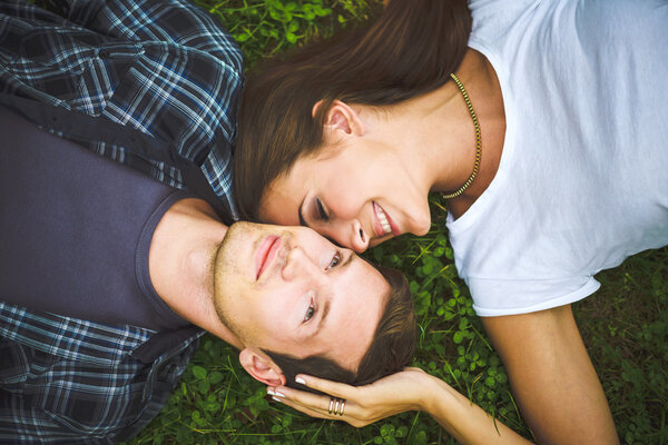 Couple lying on grass