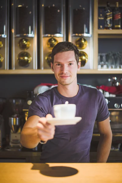 Servitören anläggning kaffe kopp Stockbild