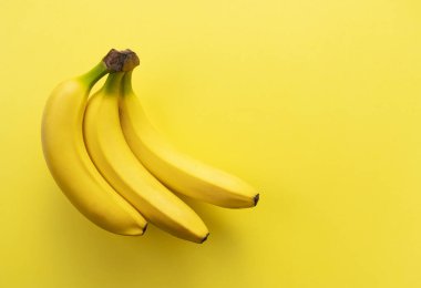 Fotokopi alanı olan sarı arkaplanda muzlar