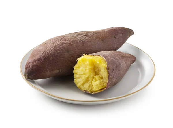 Zoete Aardappelen Tweeën Gebroken Een Witte Achtergrond Een Bord — Stockfoto
