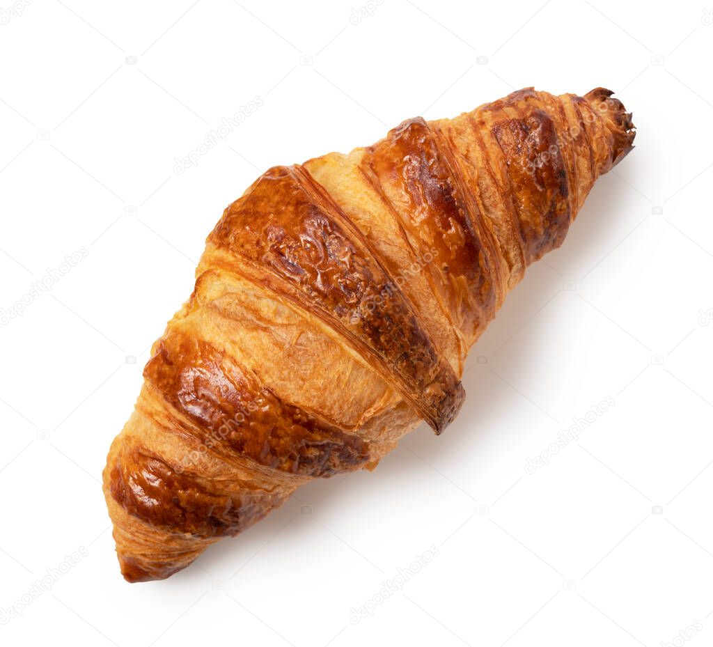 One croissant placed on a white background. A view from above
