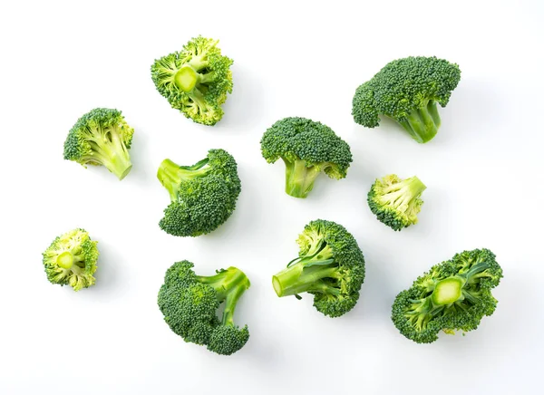 Klipp Broccoli Placeras Vit Bakgrund Utsikt Ovanifrån — Stockfoto