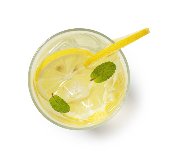 Lemonade in a glass placed on a white background. View from directly above