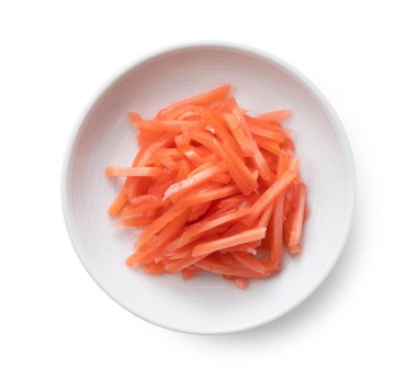 Red ginger placed on a white background. View from above.