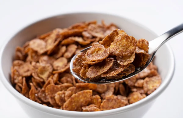 Schokolade Cornflakes Auf Einem Löffel Cornflakes Einer Schüssel Hintergrund — Stockfoto